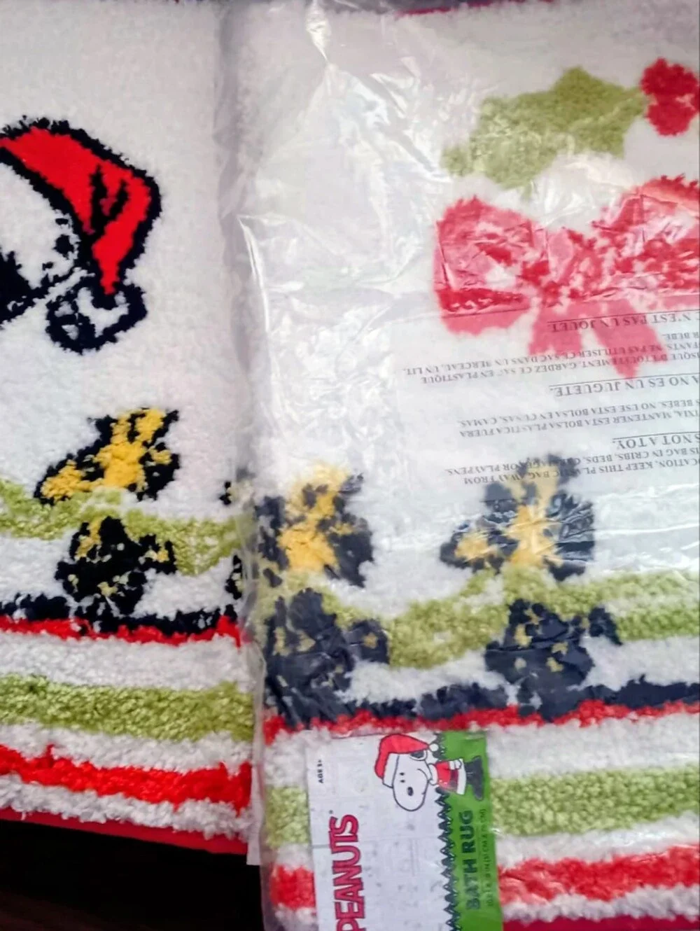 Peanuts Holiday Snoopy Striped Bath Rug - Red, White, Green